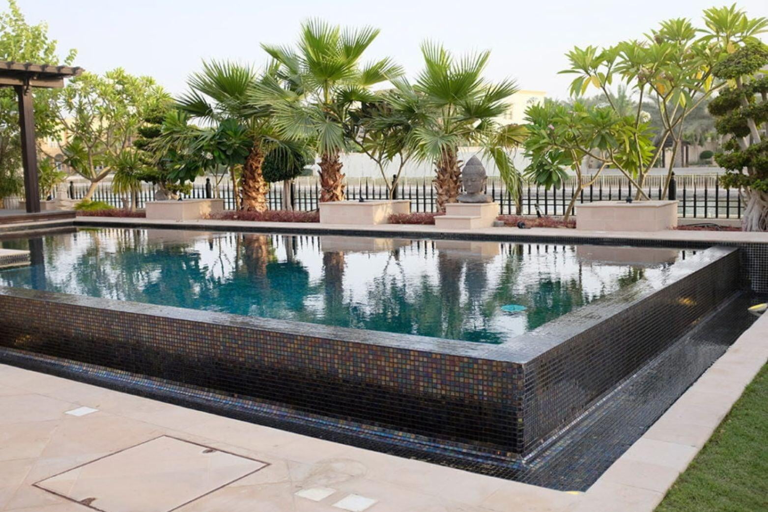 A concrete pool with vanishing edge constructed by Silver Fox